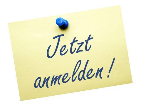 Gelber Zettel Post-It mit Aufschrift Jetzt anmelden!