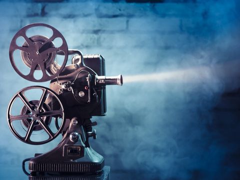 old film projector with dramatic lighting