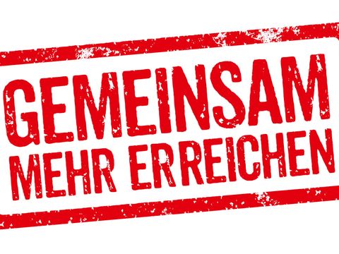 Roter Stempel mit der Aufschrift Gemeinsam mehr erreichen