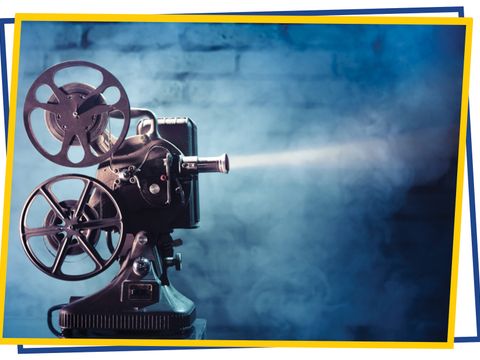 old film projector with dramatic lighting