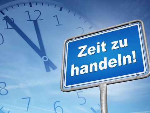 Schild mit dem Schriftzug Zeit zum Handeln