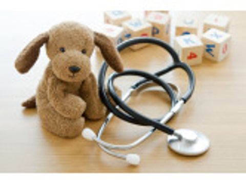 Pediatrics. Puppy toy with medical equipment