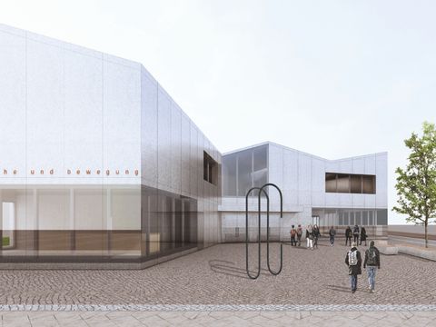Lineare Skulptur vor dem neuen Zentrum für Sprache und Bewegung, die an eine Büroklammer erinnert.