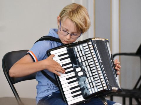 kleiner Akkordeonspieler