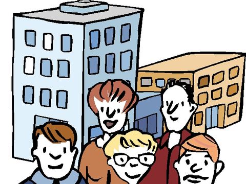 Eine Gruppe Menschen vor einigen Gebäuden