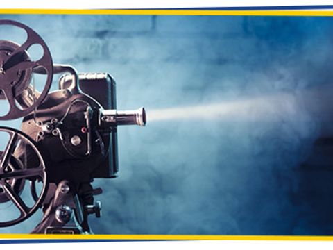 old film projector with dramatic lighting