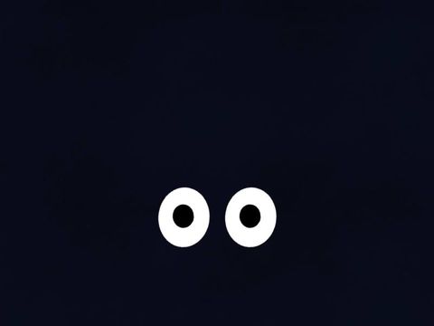 Comic-Augen vor schwarzem Hintergrund