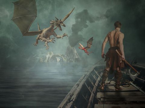 Bild: ein Mann mit Valhalla-Streitaxt steht auf dem Holzbug eines Schiffes und zwei Drachen fliegen auf ihn zu