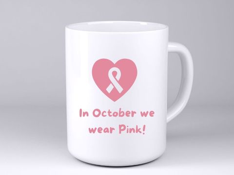 Tasse mit dem Brustkrebssymbold und Schrift: In October we wear Pink!