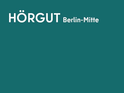 Grafik einarbig mit Schrift: HörGut Berlin-Mitte
