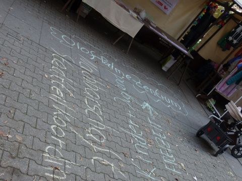 "Nachbarschaft" und "Stadtteilkoordination" mit Kreide geschrieben