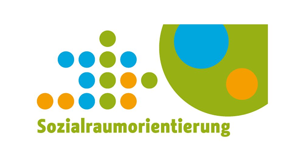 Bunte Punkte mit der Aufschrift: Sozialraumorientierung