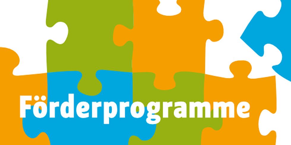 Bunte Puzzleteile mit der Aufschrift Förderprogramme