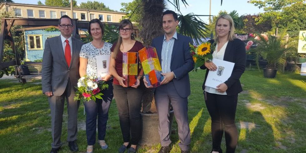 Bezirksbürgermeister Igel gemeinsam mit den beiden Siegerunternehmen