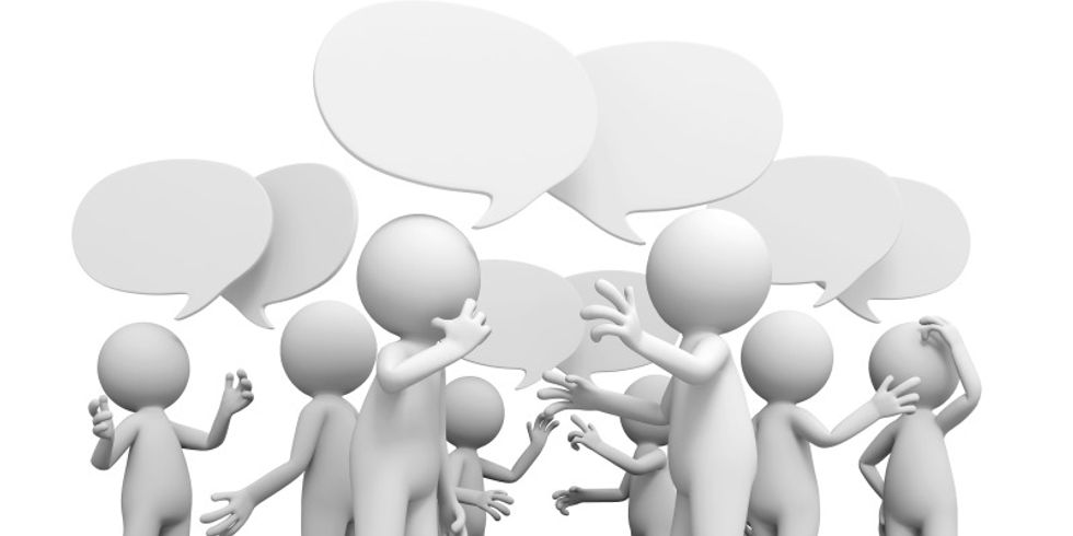 Kugelmännchen diskutieren Sprechblase