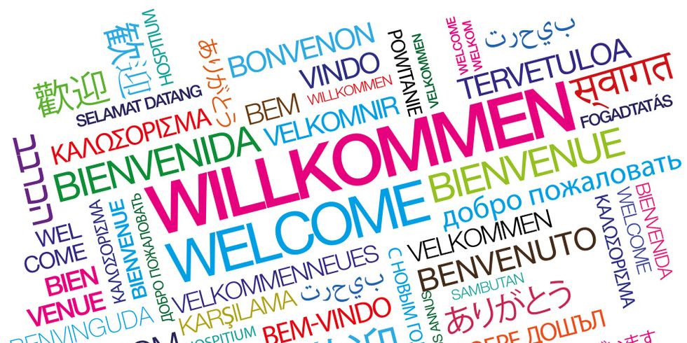 Illustration zum Wort "Willkommen“ in vielen verschiedenen Sprachen und Farben