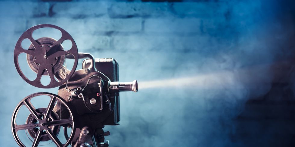 old film projector with dramatic lighting