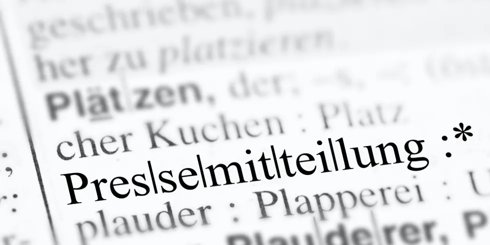 Ausschnitt eines Nachschlagewerks, wo der Fokus auf das Wort "Pressemitteilung" gelegt ist