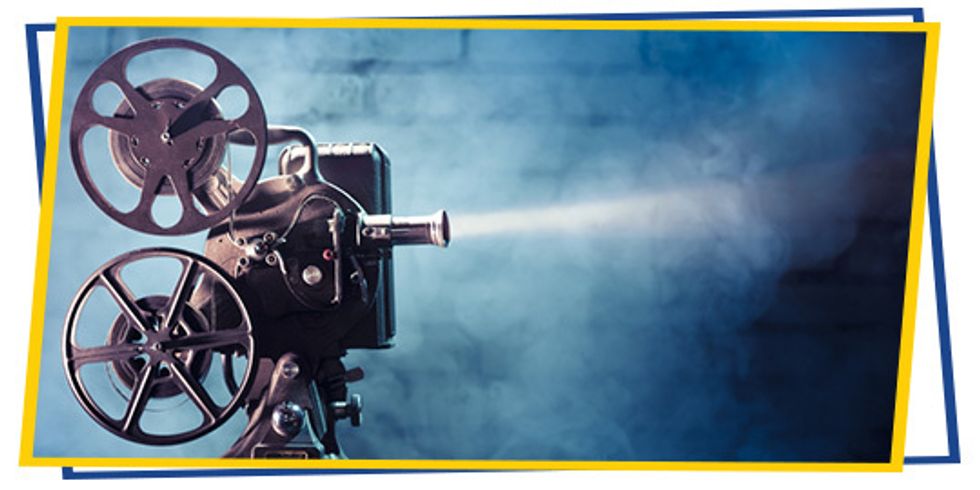 old film projector with dramatic lighting