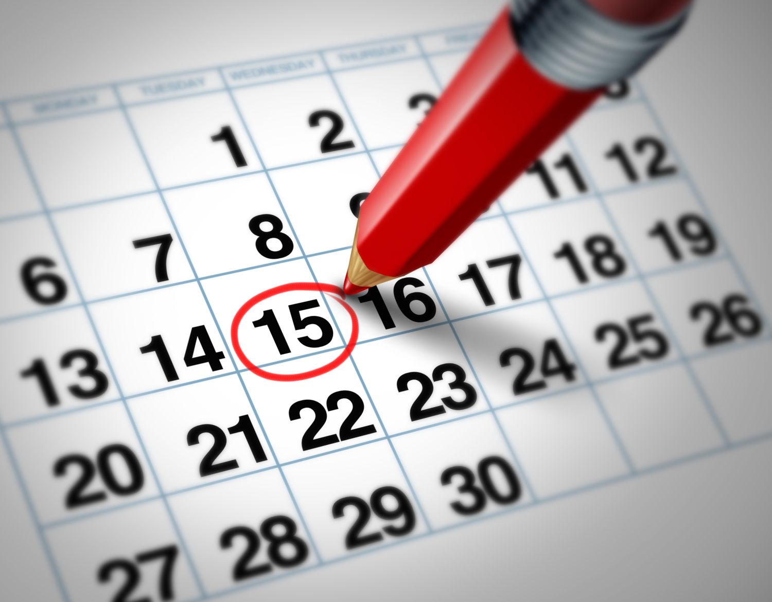 Kalender mit rotem Stift und markiertem Datum