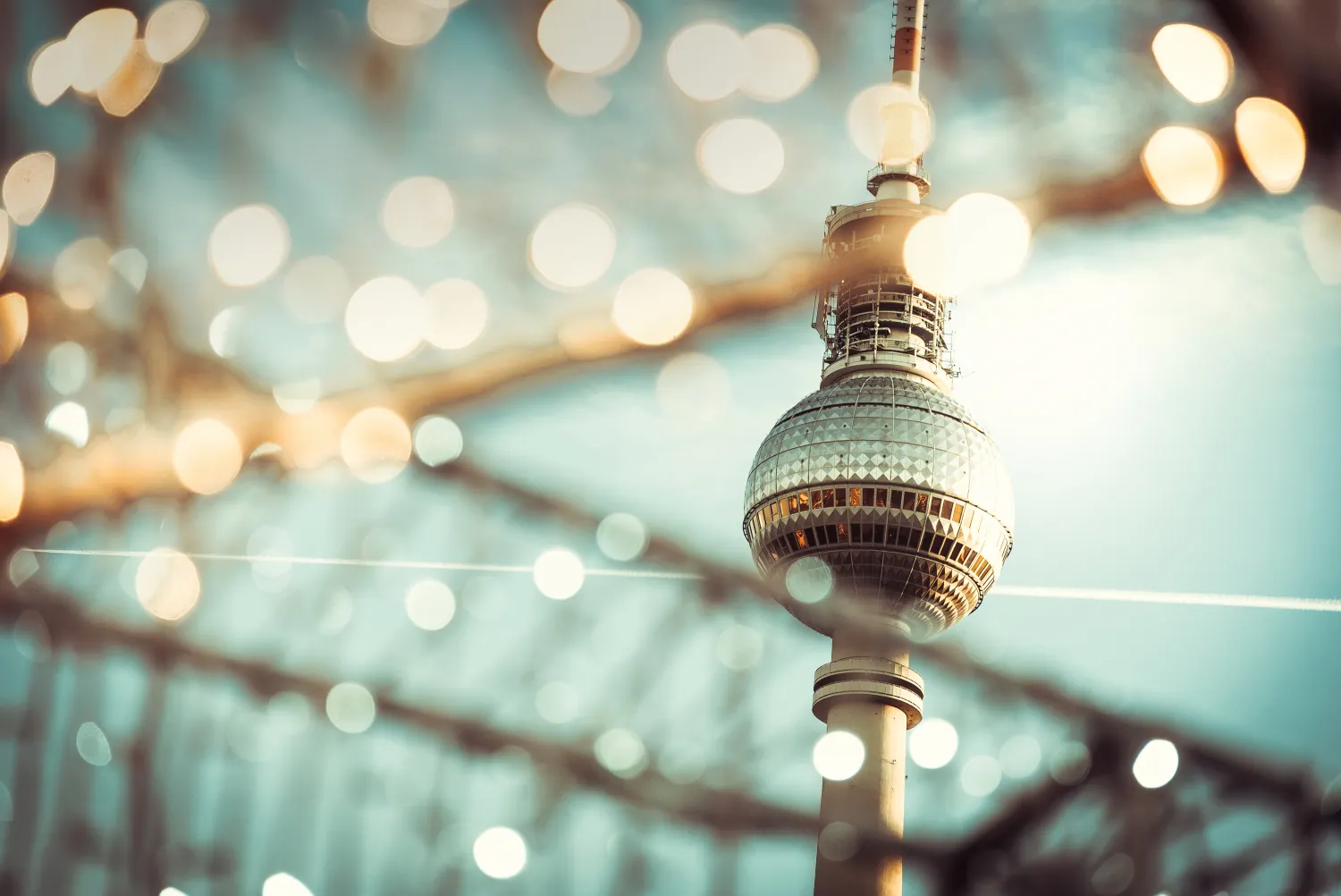 Berlin Tv-tower behind golden blurred lights