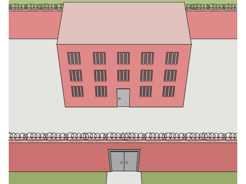 Gefängnisbau mit Mauern und Stacheldraht drumherum