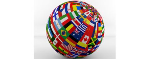 Globus bestehend aus vielen internationalen Flaggen