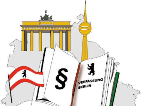 Aufgeschlagenes Gesetzbuch vor einem Umriss des Landes Berlin mit Sehenswürdigkeiten und Berliner Landesflagge