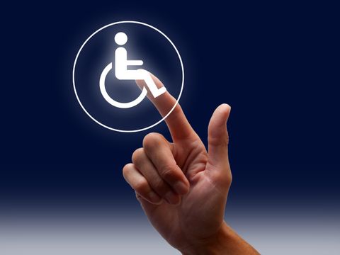 Zeigefinger berührt Symbol für Zugangsmöglichkeit für behinderte Menschen
