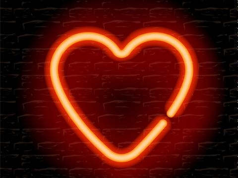 Rotes, Neon-Herz vor einer schwarzen Wand
