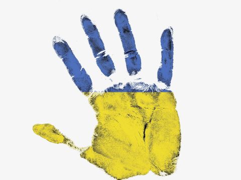 Handabdruck in der Farbe der Ukraine