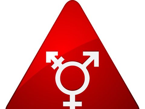 Rotes Dreieck mit verschiedenen Geschlechtersymbolen