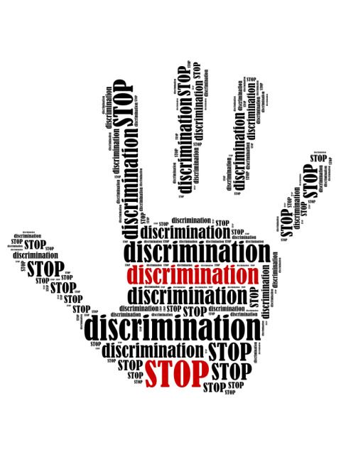 Hand mit Schrift Stop discrimination