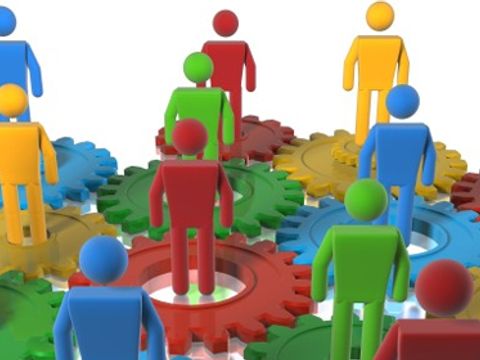 Multi colour cogs + 3D figures as a metaphor for a diverse team