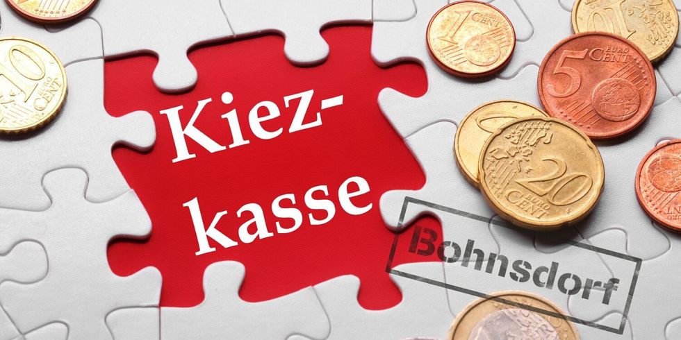 Puzzle und Geldstücke mit der Aufschrift Kiezkasse und einem Stempel mit der Aufschrift Bohnsdorf