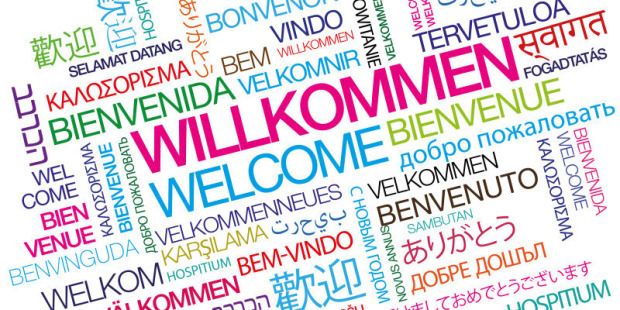 Illustration zum Wort "Willkommen“ in vielen verschiedenen Sprachen und Farben