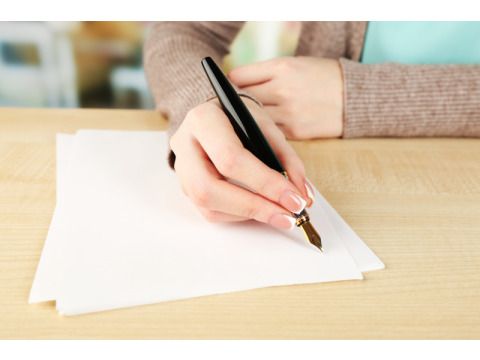 Hand Notiz Blatt Papier schreiben