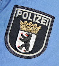 Polizei-Wappen auf Ärmel
