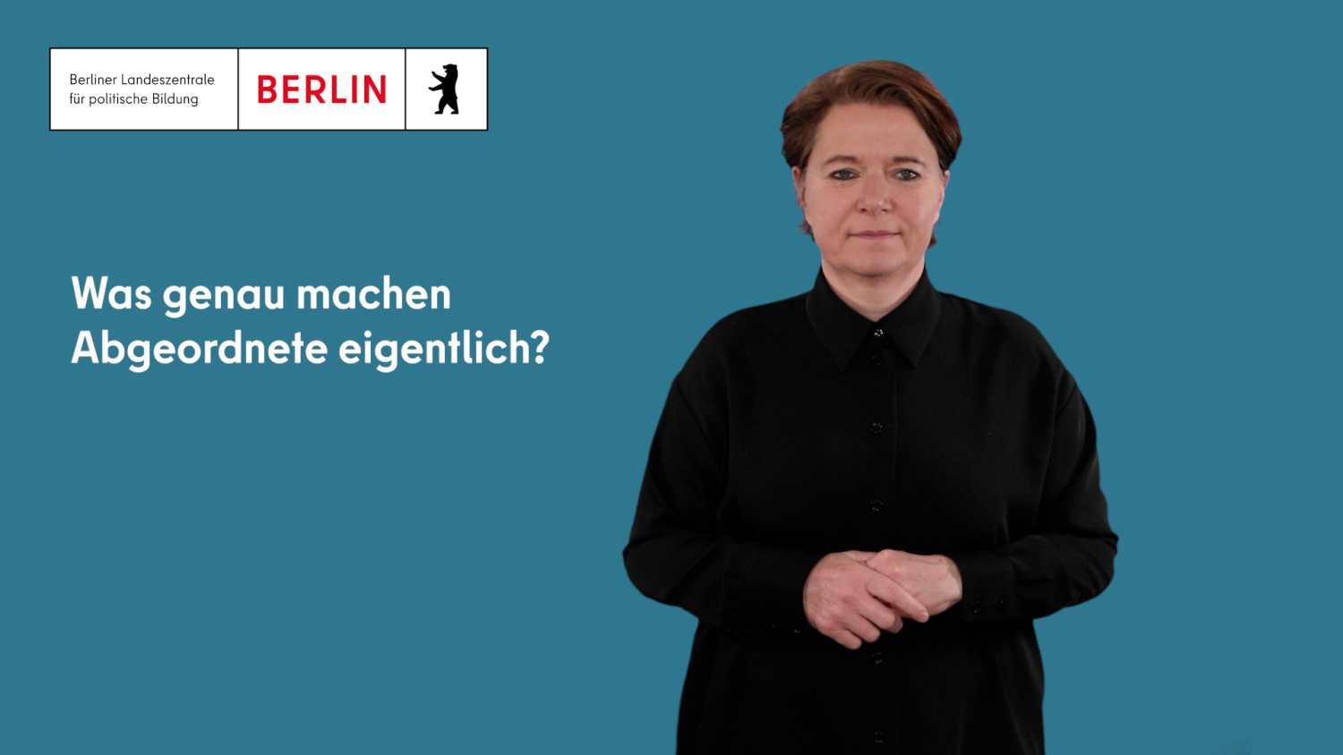 Schriftzug "Was genau machen Abgeordnete eigentlich?" mit Gebärdendolmetscherin