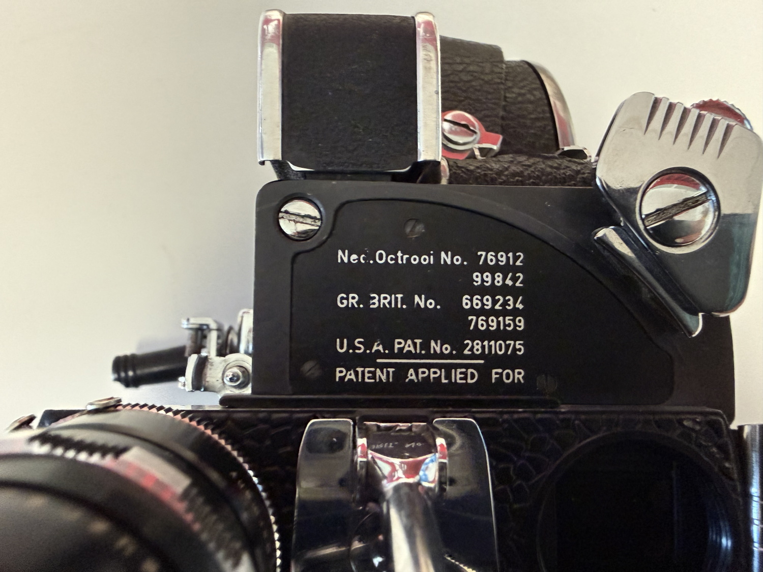 Fotoapparat Bolex H 16 Reflex - Infoplakette